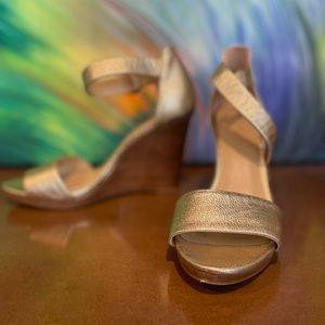 MK gold wedge with wooden heel size 7.5.